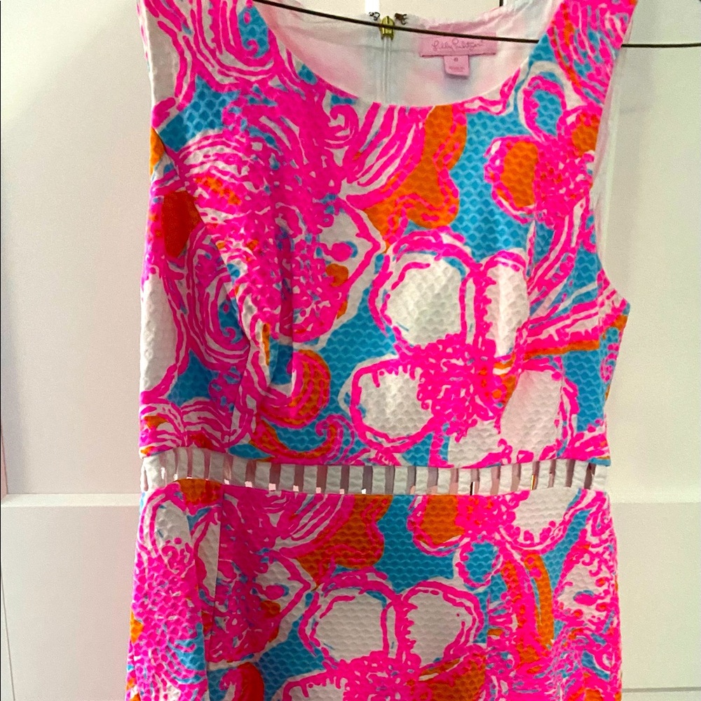 Lilly Pulitzer dress with cutouts size 8. Excellent used condition.
